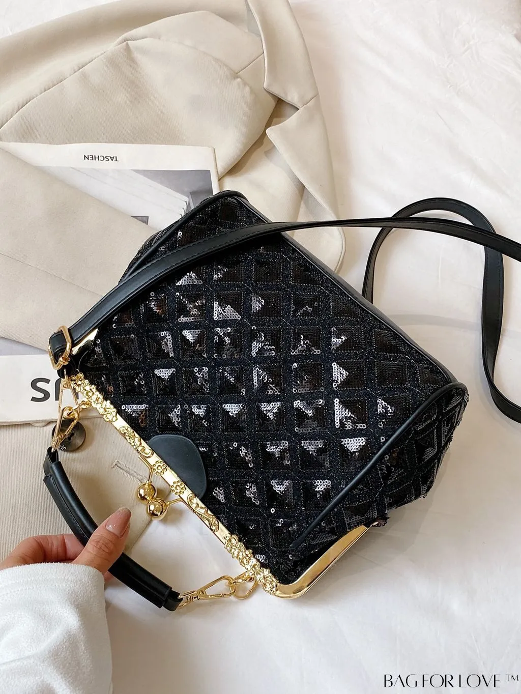 BagForLove - Chic Black Clutch: Sleek, Elegant, and Timeless