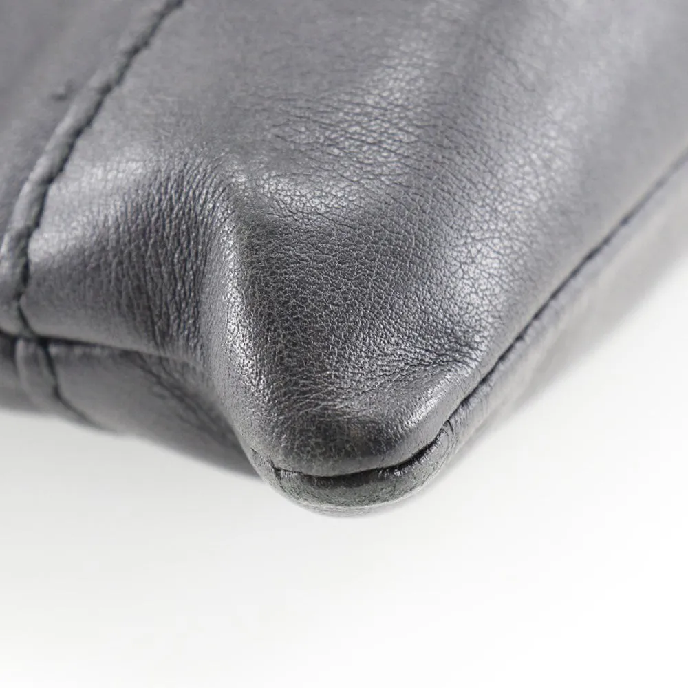 Sleek Black Lambskin Clip M Clutch Bag