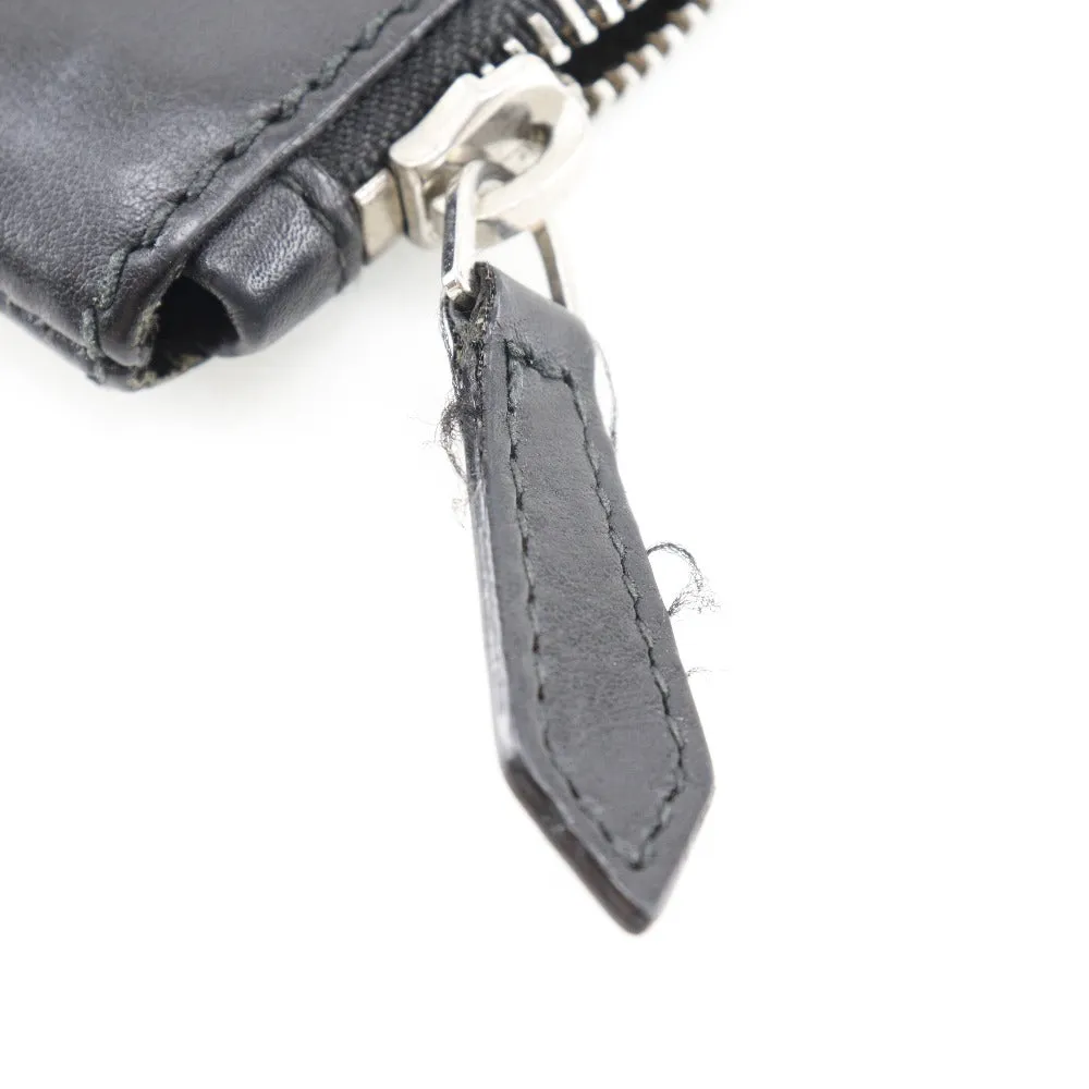 Sleek Black Lambskin Clip M Clutch Bag